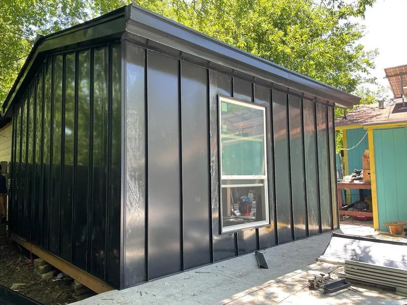Black standing seam metal wall panels for Roof Inspection in Makawao